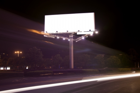 Billboard at night light trailsの写真素材
