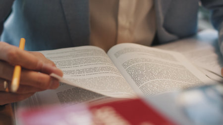 A man turns over the blank pages of the diary.