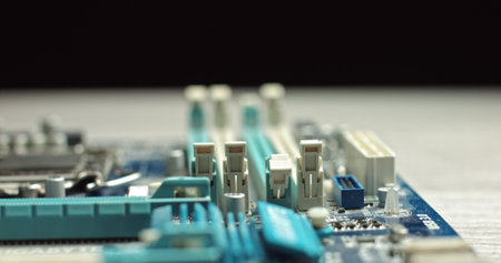 Close-up Moving Macro Shot: Inside of the Computer Case. Camera Moves Over PCB Motherboard, Showing...