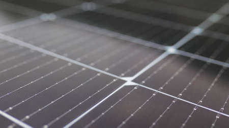 Photovoltaic solar panel extreme close up. Solar panel, photovoltaic, alternative electricity source. Close-up Photovoltaic energy station at home. Solar panels on the roof.の写真素材