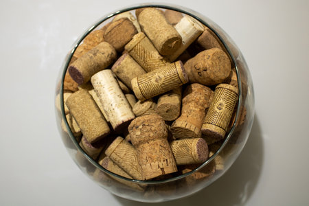 Glass jar, containing several wine corks inside, top viewの写真素材