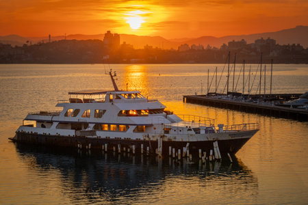 Sunset on Florianopolis, Santa Catarina Brazil, with a boat. Photo captured in June 2024の写真素材