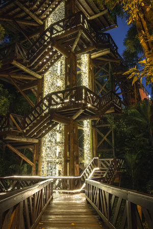 Torre dos FilÃ³sofos (Tower of the Philosophers) in the German Grove (Bosque do AlemÃ£o), access ramp, architecture, wooden tower, with Christmas decoration, at night. One of the main tourist spots. Photo captured in December 2024, in Curitiba, ParanÃ¡, Brazil.の写真素材