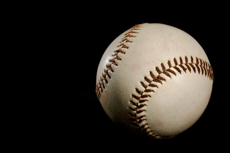 A baseball ball on black background