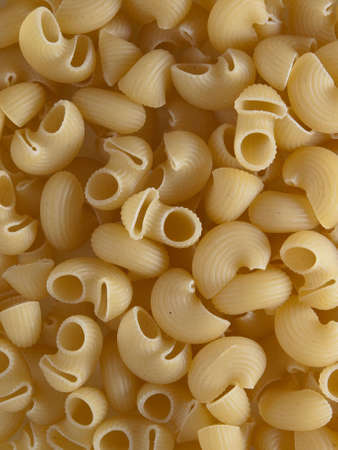Detail of a pile of raw pastaの写真素材