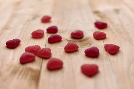 Valentines day three marmalade hearts on the wooden background.の写真素材