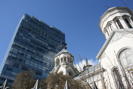 Modern office building and church