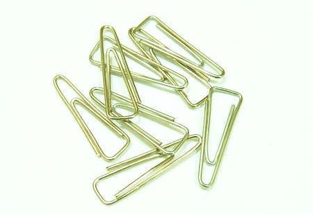 A lot of paper clips on isolated backgroundの写真素材