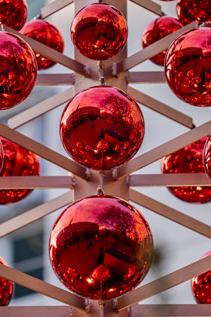 several red christmas balls arranged symmetricallyの写真素材