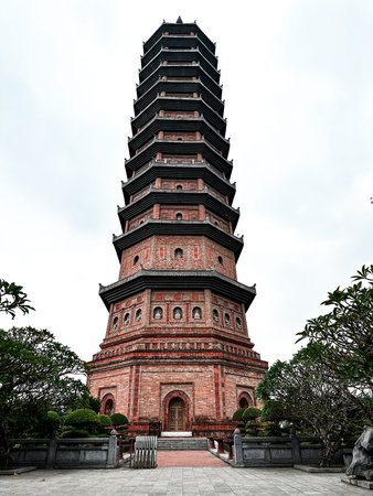 Vertical view of the Bai Dinh temple on a cloudy day in Ninh Binh, Vietnamの写真素材
