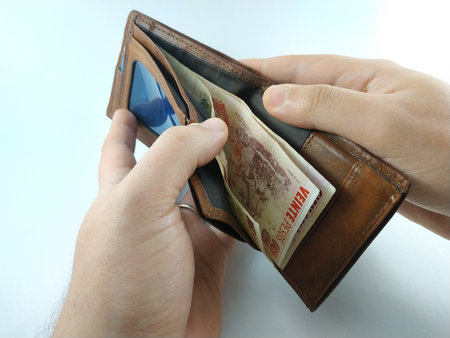 different shots delivering money and Argentine coins