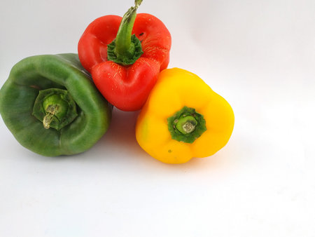 3 red yellow and green peppers