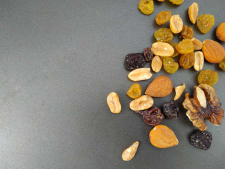 aerial view of nuts on a black backgroundの写真素材