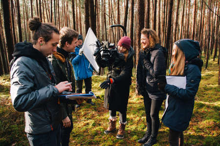 8.9.2017 Nuremberg, Germany: Behind the scene. Film crew team filming movie scene on outdoor location. Group cinema set.のeditorial素材