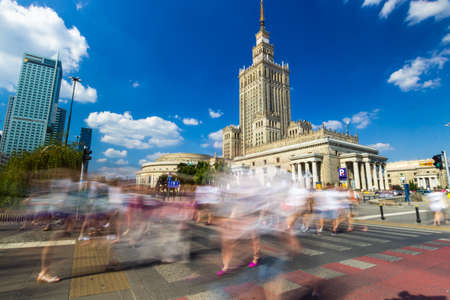 Palace of Culture and Science with a crosswalk in the foreground. It is the center for various companies, public institutions and cultural activities and authorities of the Polish Academy of Sciencesのeditorial素材