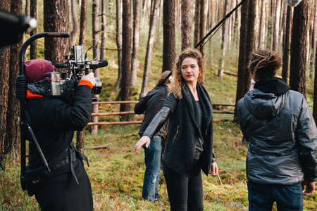 8.9.2017 Nuremberg, Germany: Behind the scene. Film crew team filming movie scene on outdoor location. Group cinema set.のeditorial素材