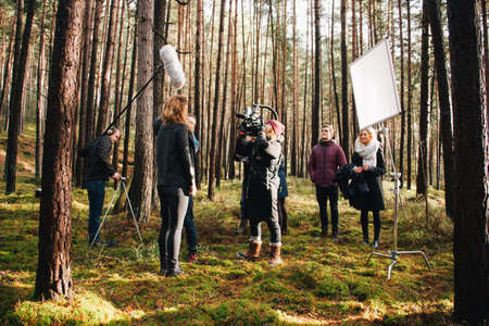 8.9.2017 Nuremberg, Germany: Behind the scene. Film crew team filming movie scene on outdoor location. Group cinema set.のeditorial素材