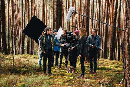 8.9.2017 Nuremberg, Germany: Behind the scene. Film crew team filming movie scene on outdoor location. Group cinema set.のeditorial素材
