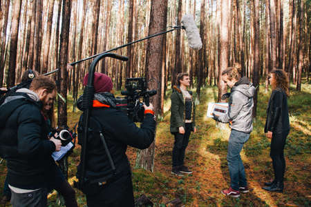 8.9.2017 Nuremberg, Germany: Behind the scene. Film crew team filming movie scene on outdoor location. Group cinema set.のeditorial素材