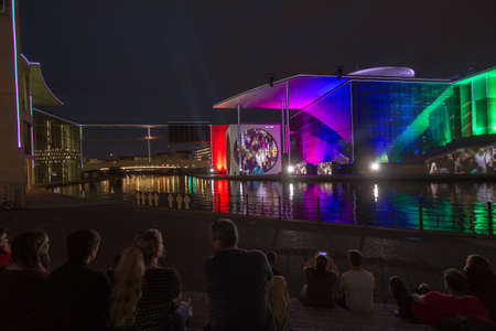 Berlin, Germany - Marie-Elisabeth-Lueders-Haus in the government district of Berlin with unidentified people at night during a light show. It is one of the buildings of the German Bundestag.のeditorial素材