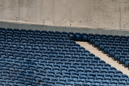 Blue seats of Porto's stadium with nobody in the because of corona virus restrictions. Matches are...