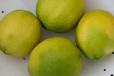 White container with yellow lemons