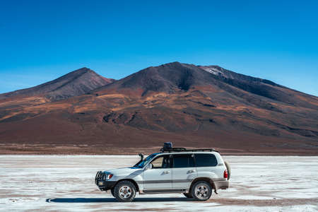 A car in the salt flats of Bolivia, Salar de Uyuni 2の写真素材