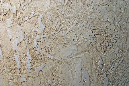 Golden venetian stucco wall texture background pattern Golden venetian stucco wall texture background pattern