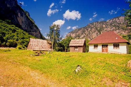Blue summer skies and picturesque traditional rural house in mountain village(Montenegro)のeditorial素材
