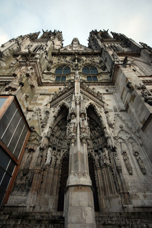 The ornate main entrance of the Gothic medieval St. Peter's Cathedral  (Regensburg, Germany)....