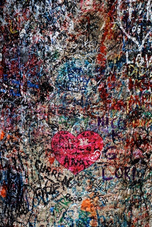 Vertical image with love messages and hearts on the famous wall of Juliet and Romeo house(Verona, Italy)のeditorial素材
