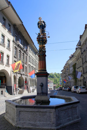 The Fountain statue of Lady Justice on the Gerechtigkeitsbrunnen in the Old City of Bern,...
