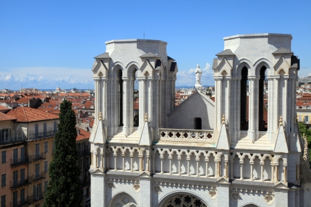 Basilique Notre Dame de Nice and red tile roofs of old houses, Nice, France  View from aboveのeditorial素材