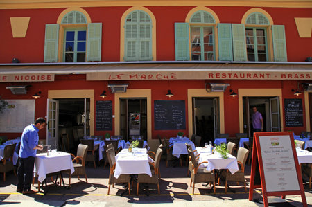 Nice, France â May 13, 2013: Outdoor french restaurants with typical Nicoise cuisine on the Cours Saleya - is the most active and traditional square in Nice, with its daily flower market. Cours Saleya is one of the most famous market areas and main attrのeditorial素材
