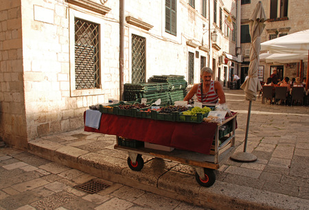 DUBROVNIK, CROATIA - JULY 20, 2011: Fruit and vegetable stall at a medieval square in Old Town of Dubrovnik, Croatia. のeditorial素材