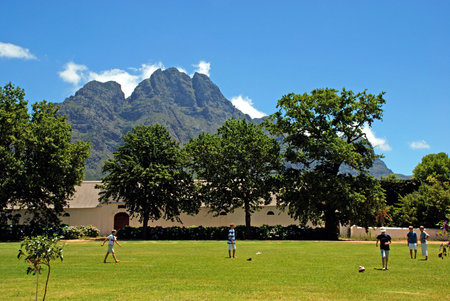 WESTERN CAPE, SOUTH AFRICA - DECEMBER 31,2007: Unidentified boys playing with ball on scenary wine farm in Western Cape Province, South Africaのeditorial素材