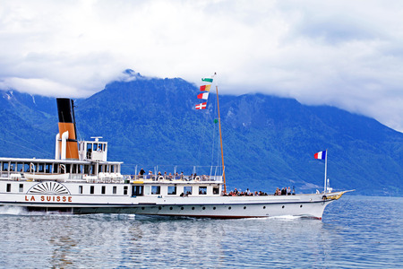 MONTREUX, SWITZERLAND - MAY 09, 2013: Cruise boat La Suisse on Lake Geneva (Lac Leman) in Montreux, Switzerland. Paddle steamer La Suisse built in 1910.のeditorial素材