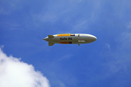 STEIN AM RHEIN, SWITZERLAND - MAY 5, 2013: The blimp Zeppelin fly over Stein am Rhein, Switzerlandのeditorial素材