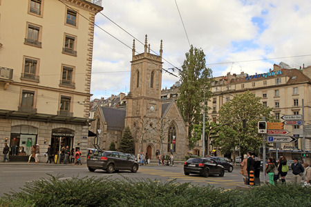 GENEVA, SWITZERLAND - MAY 10, 2013: Cityview with English Church of the Holy Trinity and  Rue de Mont-Blanc in Geneva, Switzerland.のeditorial素材