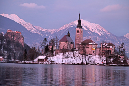 Winter landscape of Bled Lake and island church, Slovenia. Sunset lightのeditorial素材
