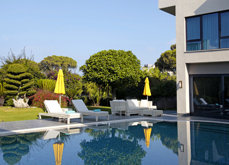 pool bed in the garden near the resort pool for relax on beautiful resortのeditorial素材