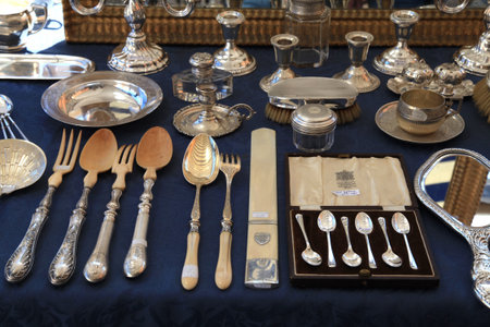 NICE, FRANCE - MAY 13, 2013 : Antique silverware on antique market The Cours Saleya, Nice, Franceのeditorial素材