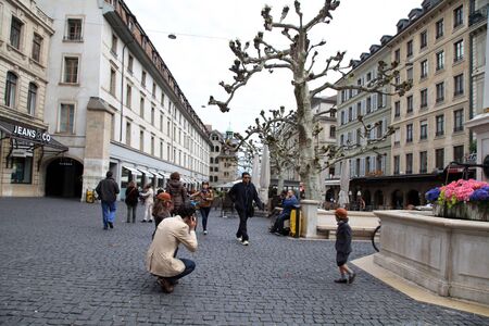 GENEVA, SWITZERLAND - MAY 11, 2013: People walking on the street in historical center of Geneva, Switzerland.のeditorial素材