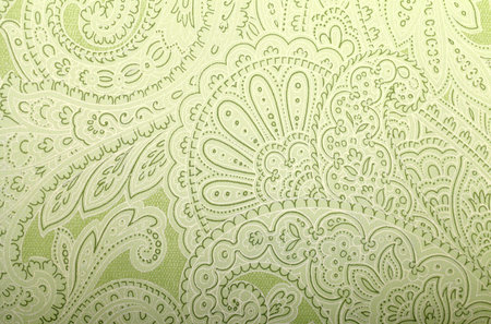 Vintage grey and green wallpaper with paisley pattern, toned image