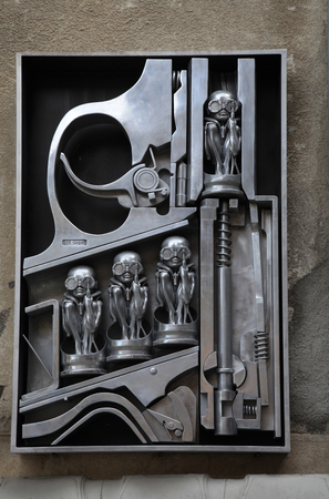 GRUYERES, SWITZERLAND - MAY 8, 2013: Birth machine sculpture by H.R. Giger in front of H.R. Giger Museum in Gruyeres, Switzerlandのeditorial素材