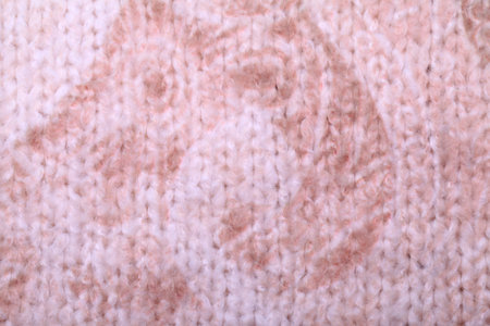 Knitting white and beige pattern background texture