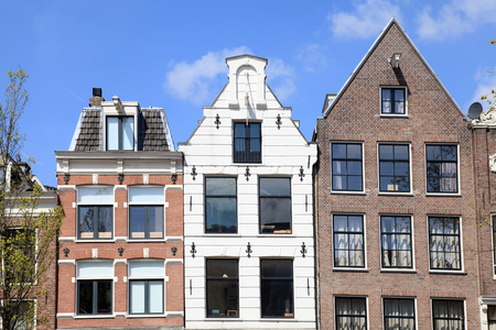 Traditional dutch medieval buildings in Amsterdam, Netherlandsの写真素材