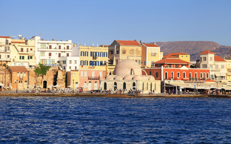 CHANIA, GREECE - JULY 21, 2016: old harbor of Chania with Venetian quay and Kucuk Hasan Pasha Mosque, Crete, Greeceのeditorial素材
