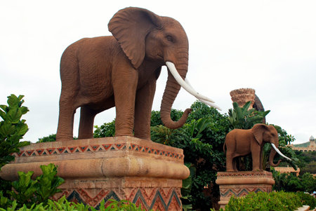 SUN CITY, SOUTH AFRICA - JANUARY 03, 2008: Gigantic statues of elephants on the Bridge of Time in entertainment park of Lost City, South Africa.のeditorial素材