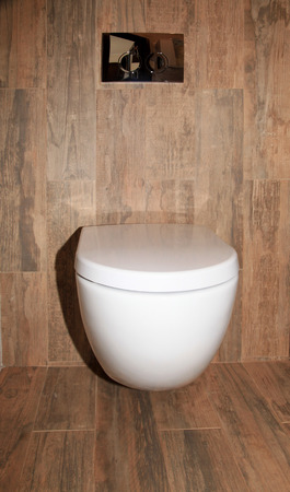 White toilet bowl in a modern bathroomの写真素材
